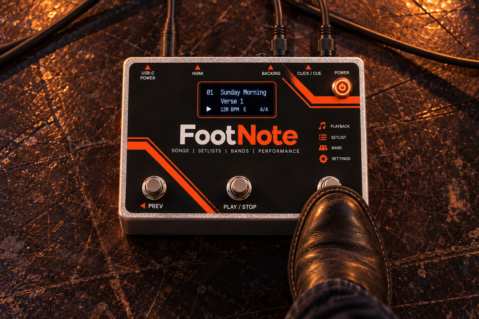 A musician's boot on a FootNote footswitch, seen from above.